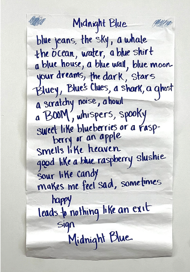 A poem titled "Midnight Blue," written on a large white sheet for a group project.
